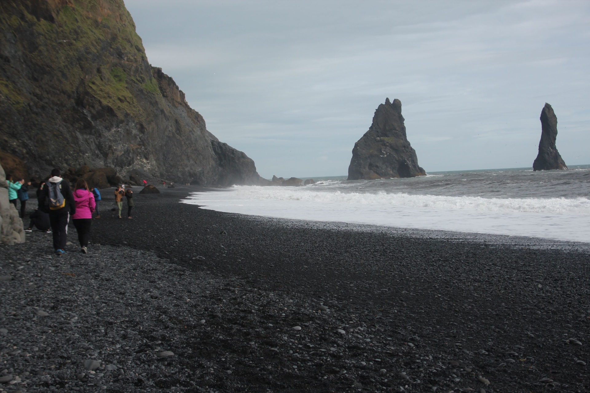 Reynisfjara black sand beach with basalt sea stacks